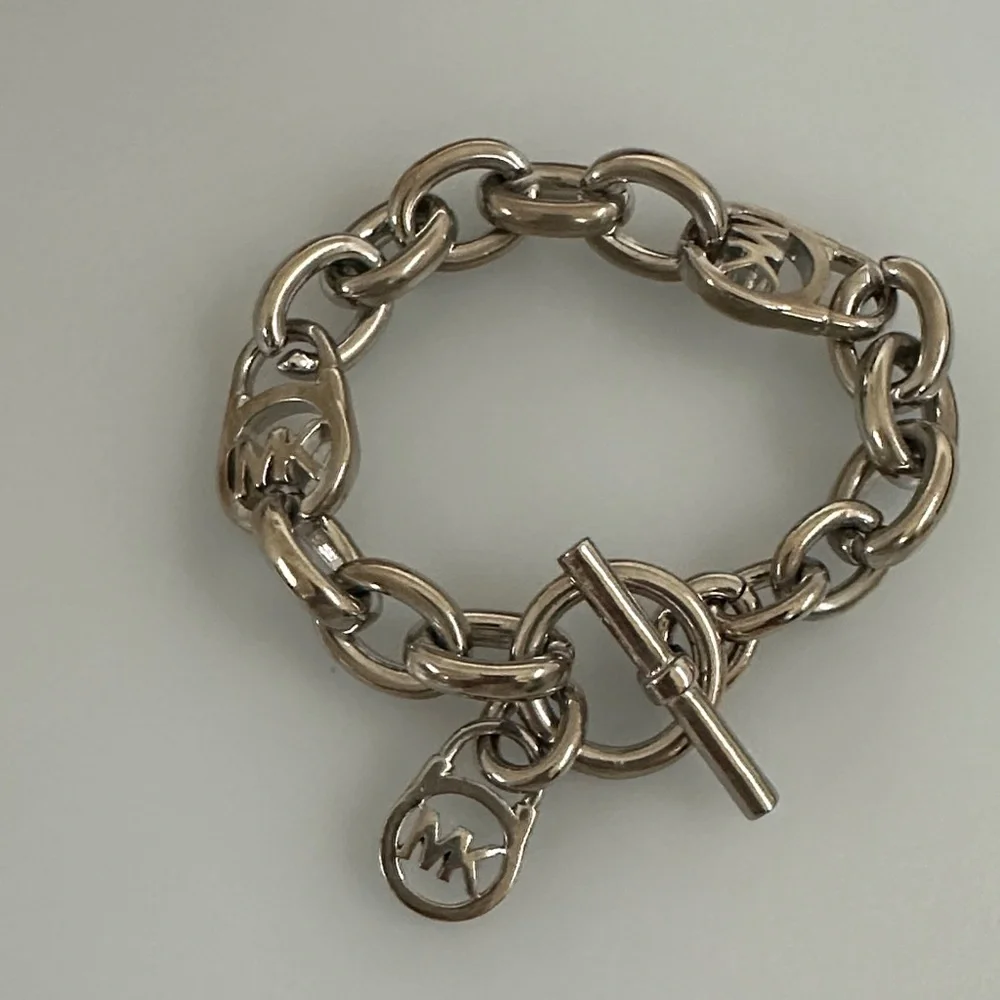 Michael Kors Polished Silver Toggle Link Bracelet with MK Charm